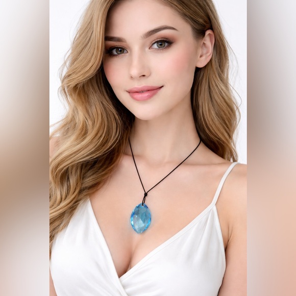 Swarovski Jewelry - SWAROVSKI Aqua Scuro Crystal Teardrop Pendant Necklace On Black Cord-5083475
